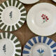 Vintage floral plates, country chic bohemian style.