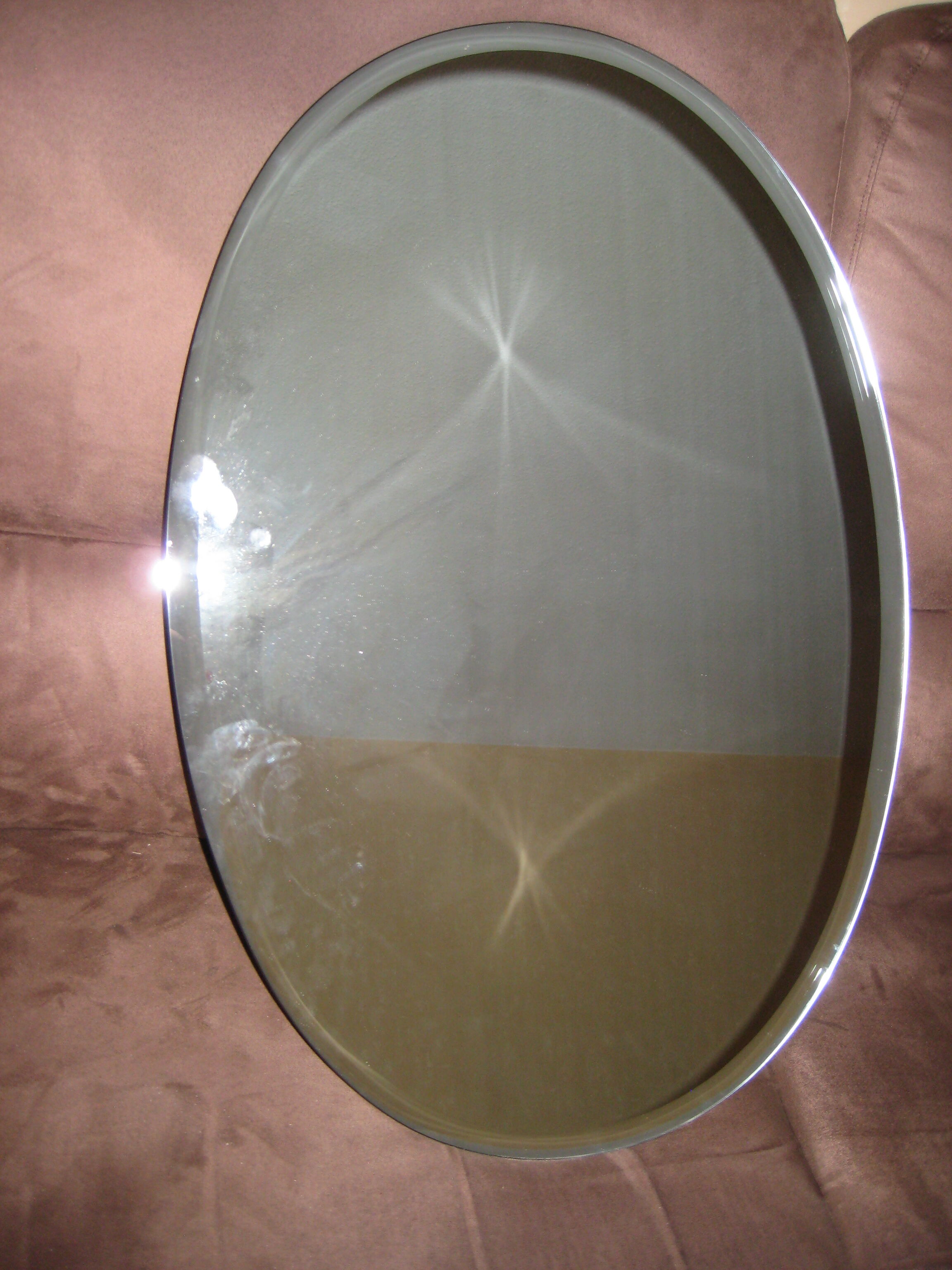Miroir ovale biseauté