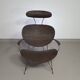 Fauteuil conçu par Yuzuru Yamakawa Structure en métal. Assise et dossier en rotin tressé.