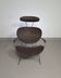 Armchair designed by Yuzuru Yamakawa  Metal frame.  Seat and back in braided rattan.