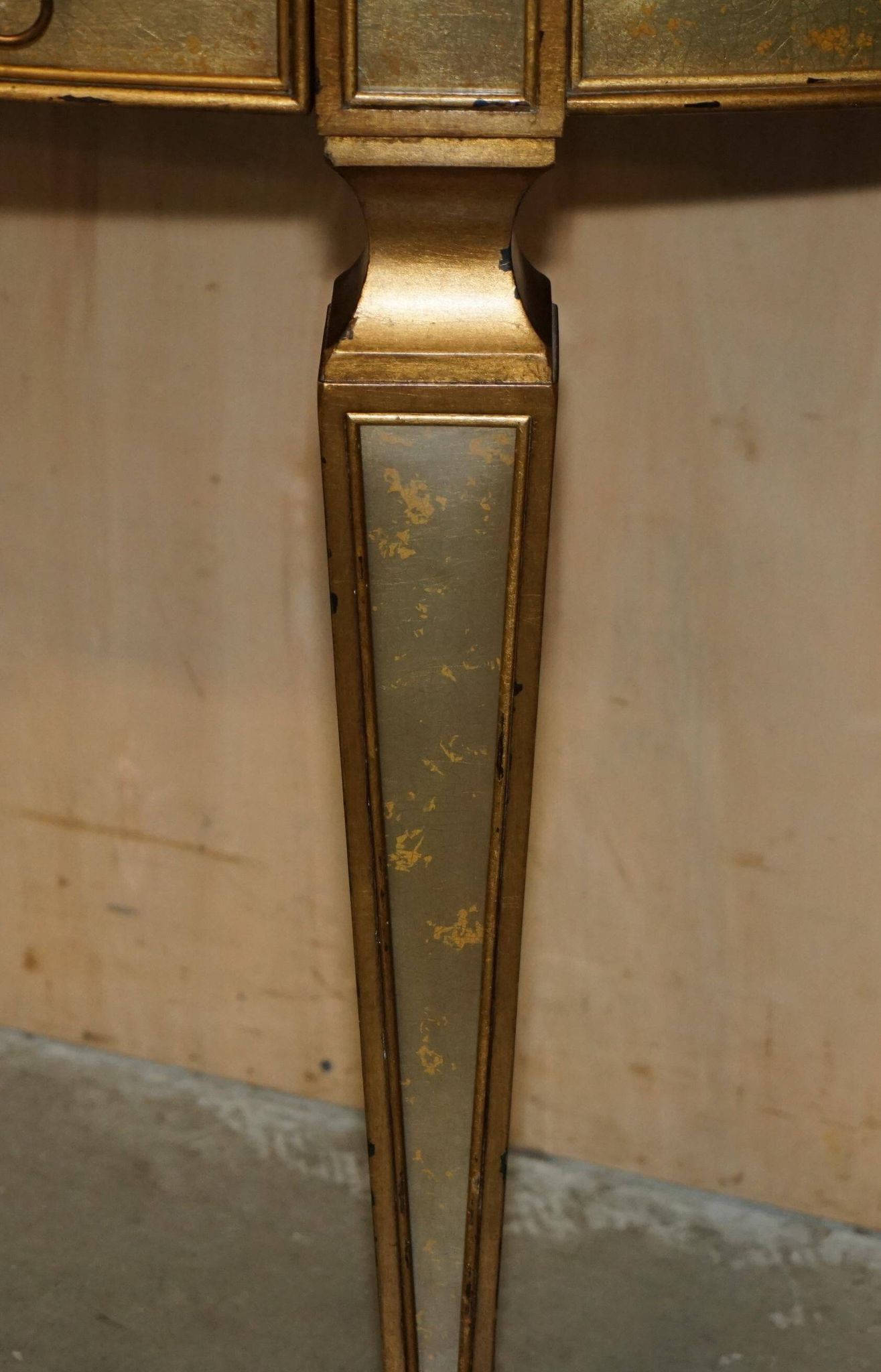 Half-moon console Eglomise Theodore Alexander with a gold finish.
