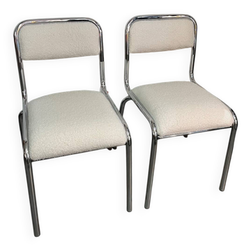 Pair of chrome chairs upholstered in boucle fabric.