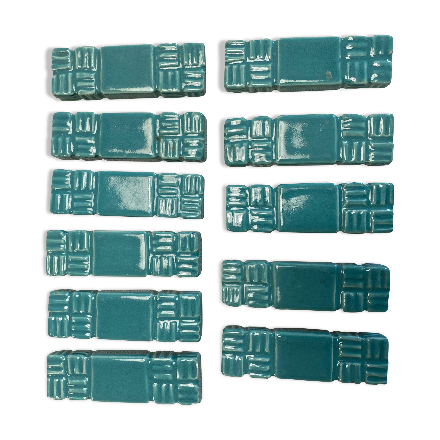 11 ceramic knife holders signed Jean Garillon