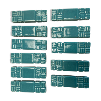 11 ceramic knife holders signed Jean Garillon