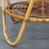 1960s Italian rattan coffee table with glass top, mid-century round design
