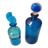 Set of two blue glass bottles