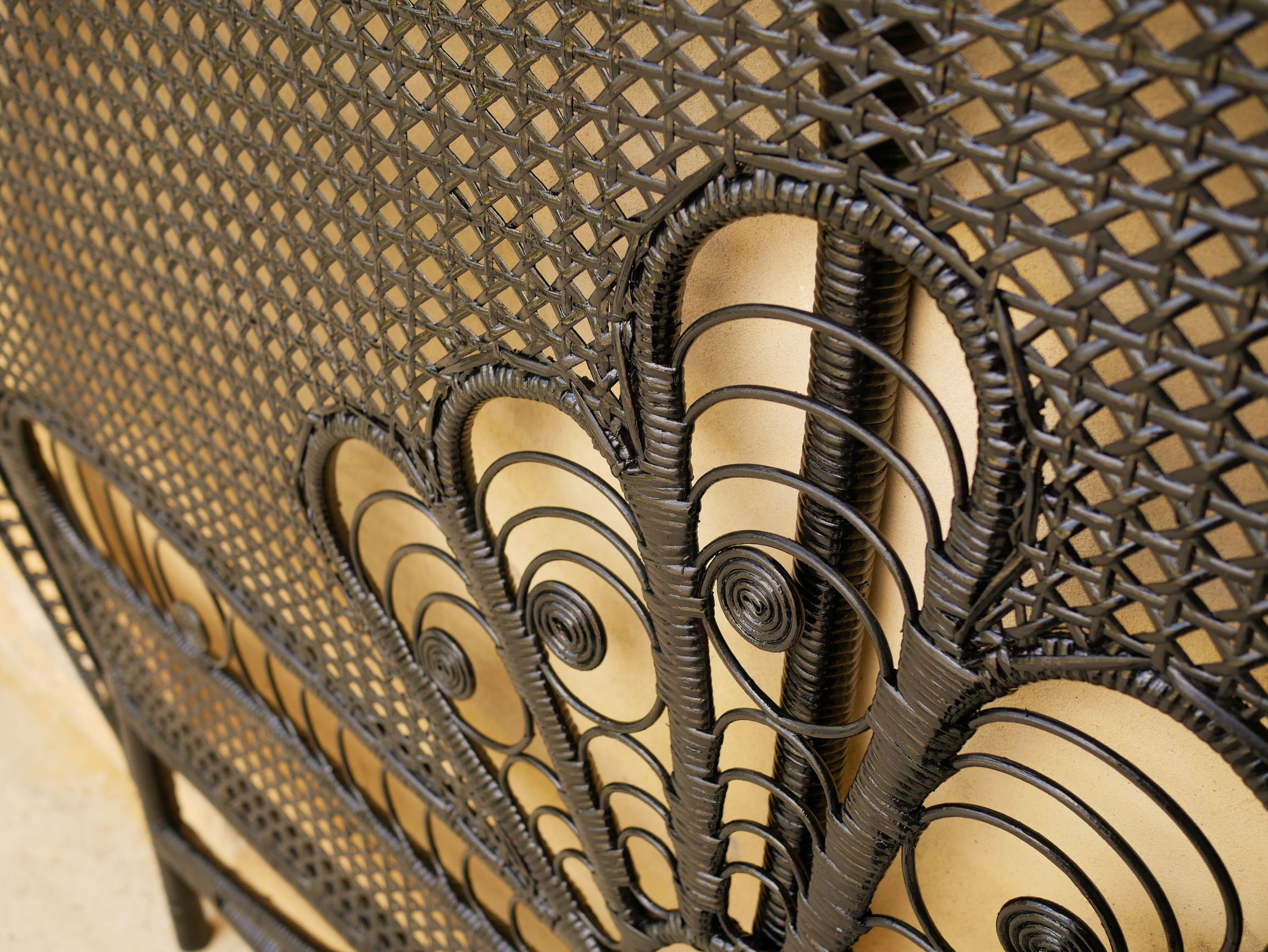 Vintage headboard in black rattan
