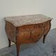 Commode style Louis XV en marqueterie et bois de rose