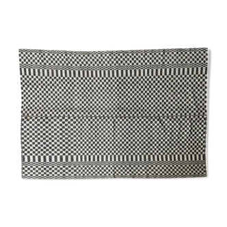 Romanian floral rug handwoven in wool, white and black background