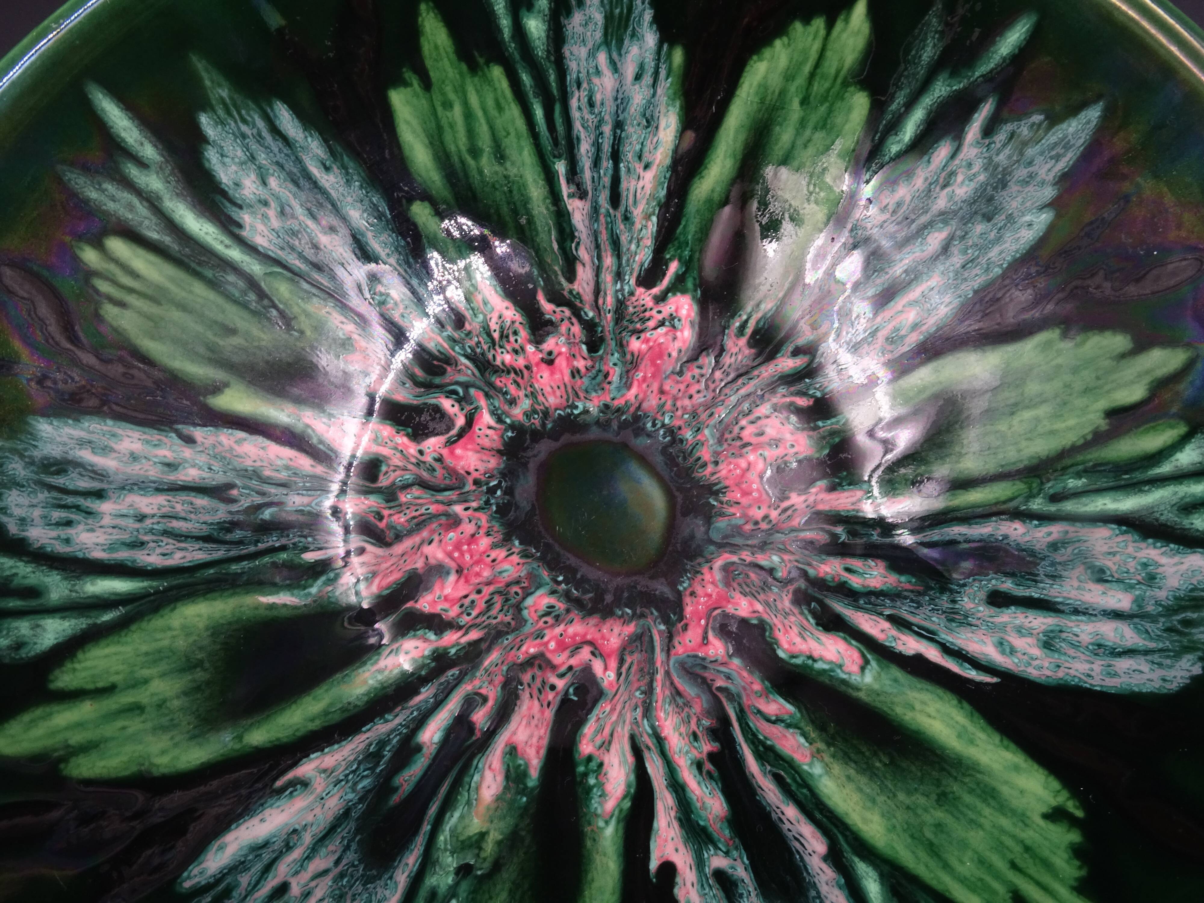 Green faience bowl decorated with multicolored drips around 1970