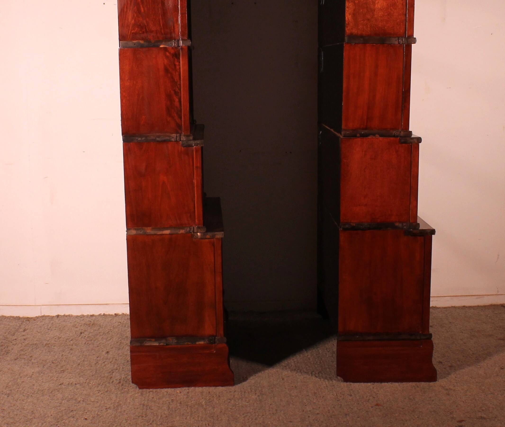 pair of Globe Wernicke London 'waterfall' bookcases in mahogany circa