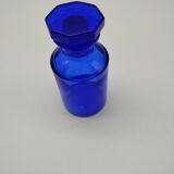 Old perfume bottle in cobalt blue glass
