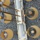 Vintage chandelier in gilded brass, chromed metal and plexiglass from the 1950s
