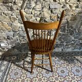 Wooden armchair with high back
