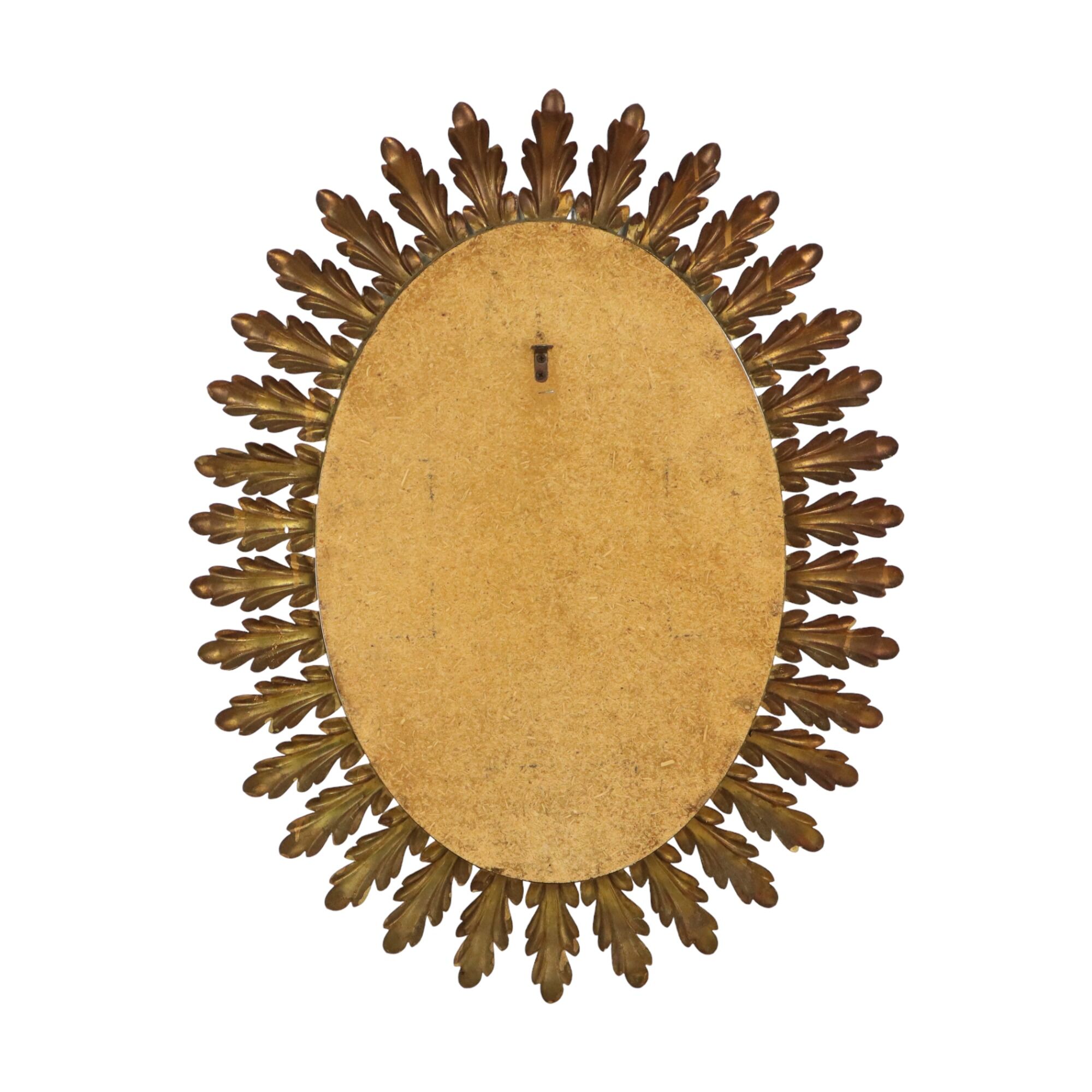 Deknudt sun mirror sunburst mirror oval gold-colored metal 70x56cm